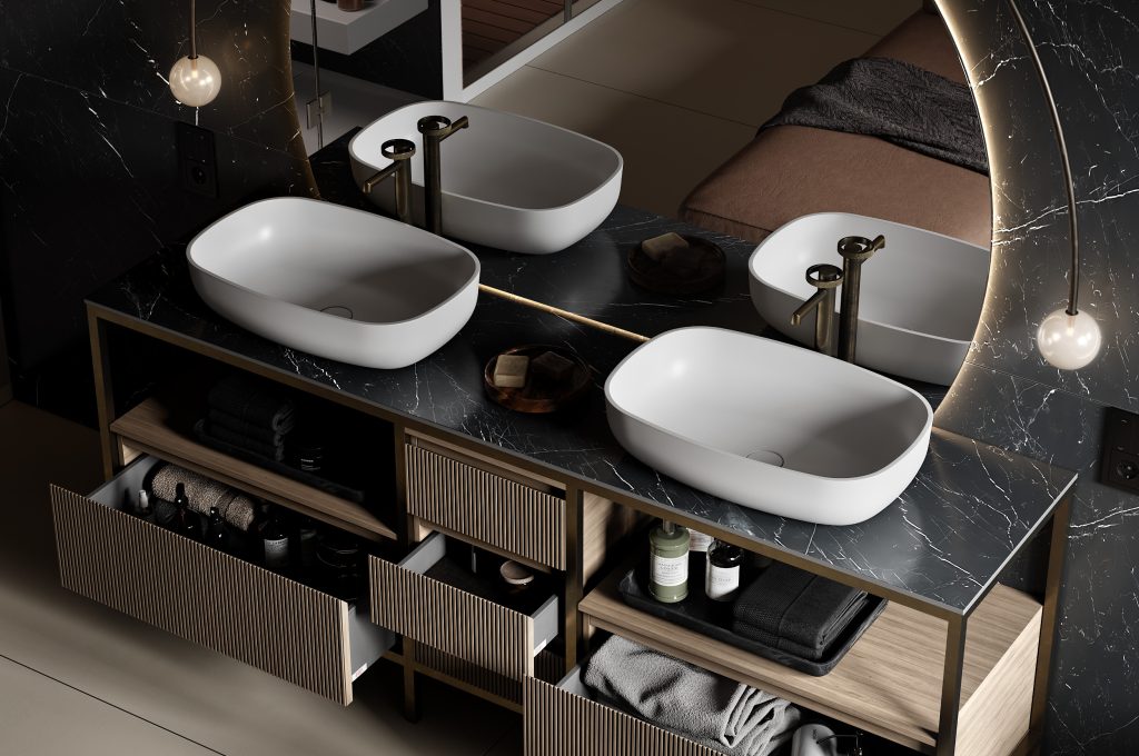 Twin countertop basins with bronze taps on a dark marble vanity by MOMA Design