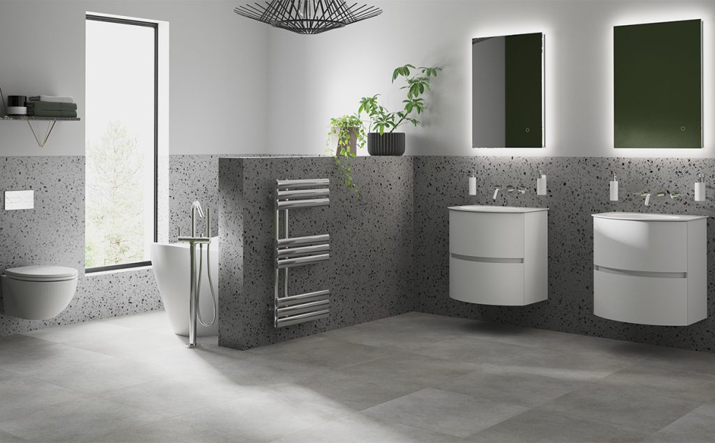 Terrazzo-tiled bathroom with wall-hung vanities and illuminated mirrors by Catalano