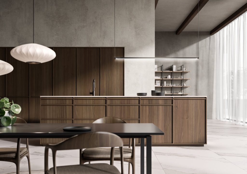 Long walnut kitchen island with a black tap and integrated sink in front of walnut tall units
