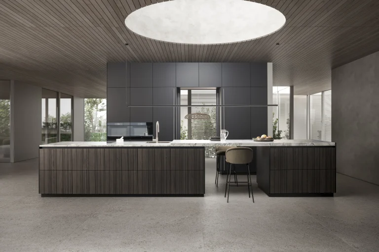 Leicht kitchen with a dark island and stone worktop