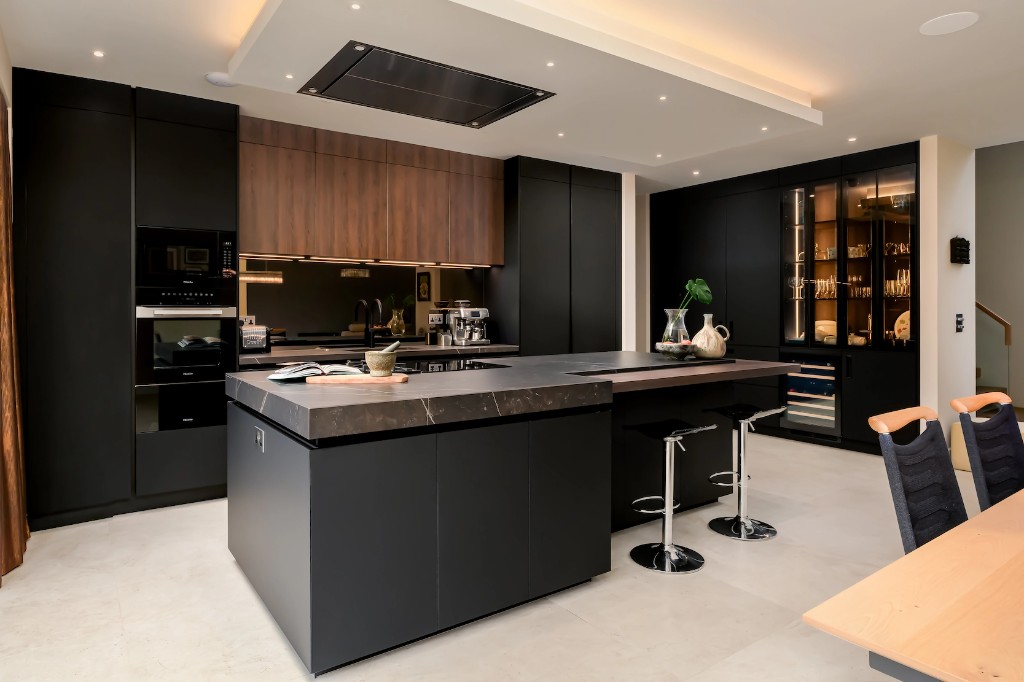 Bespoke German kitchen island in Crowthorne with dark stone worktop and walnut breakfast bar