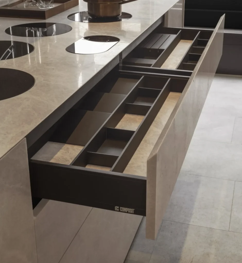 Composit kitchen drawer with integrated organisers and soft-close runners