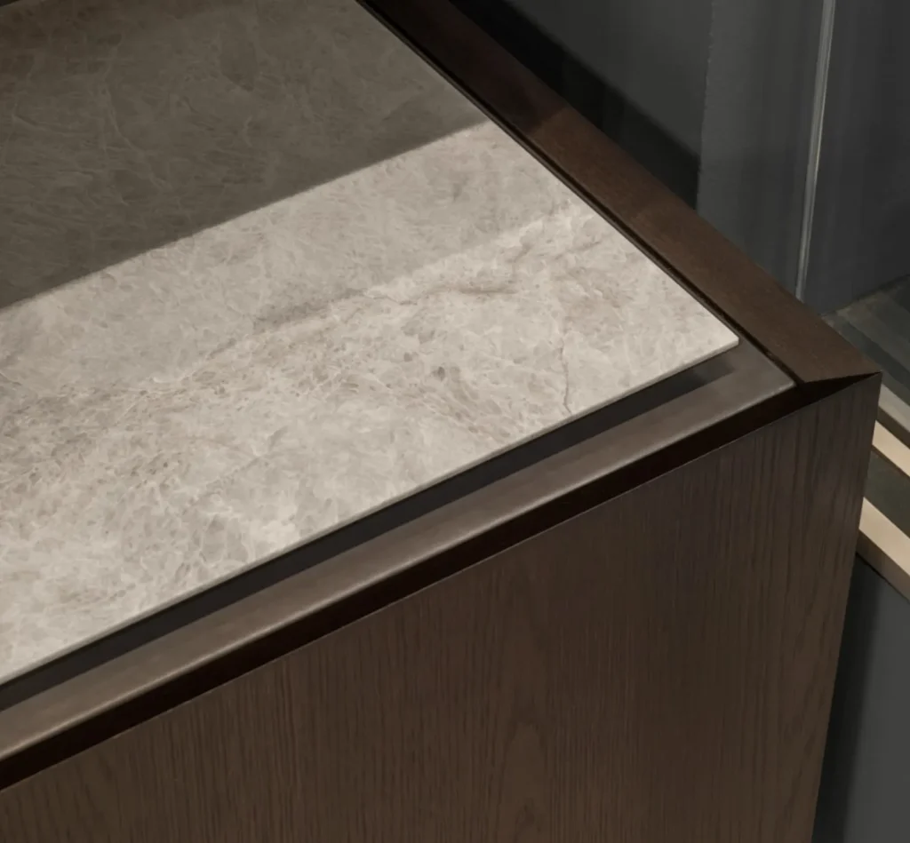 Composit wood veneer and matt stone kitchen finishes